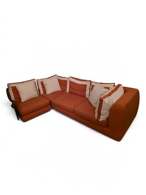 an image of a couch with pillows on it on a white background