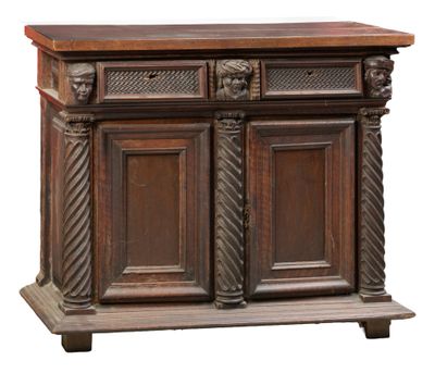 an image of a wooden sideboard with carvings on it