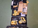 yellow and black construction tools sitting on top of a green floor