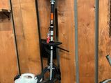 a picture of a woodworking shop with tools on the wall