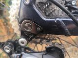 a close up view of a bicycle with a chain link