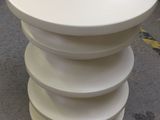 an image of a white table that is on the ground