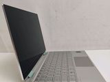 a laptop that is sitting on a white table