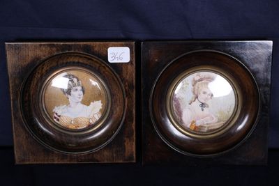 two framed pictures of a woman and a man on a black background