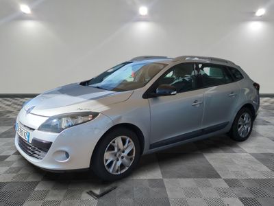 a picture of a silver car on a checkered floor