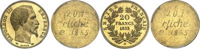 a close up of four gold coins on a white background