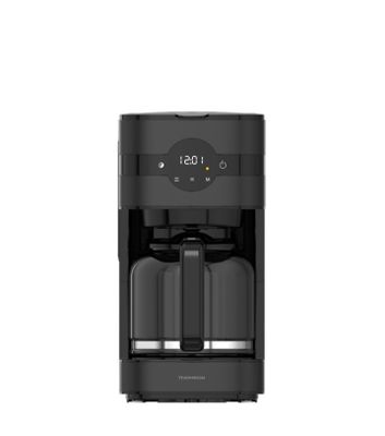 a black coffee maker sitting on top of a white surface