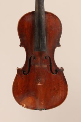 an old violin with a bow on a white background