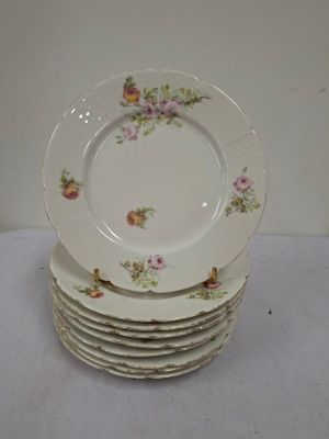 four plates stacked on top of each other on a table