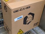 a cardboard box that is sitting on a metal shelf