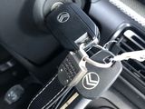 a car dashboard with a bunch of keys in it