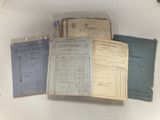 some old papers are sitting on top of a white table