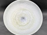 a white bowl that is sitting on top of a table