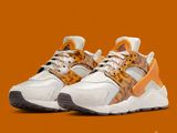 La Nike Air Huaracan est une basket blanche et orange