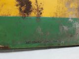 a picture of a yellow and green painting on the wall