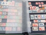 a book with a lot of stamps inside of it