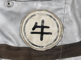 a close up of a bag with a patch on it