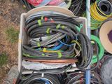 a box full of hoses and hoses sitting on the ground