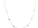 a silver necklace with black diamonds on a white background