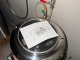 a metal tank with a paper on top of it