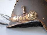 a close up of a helmet on a table