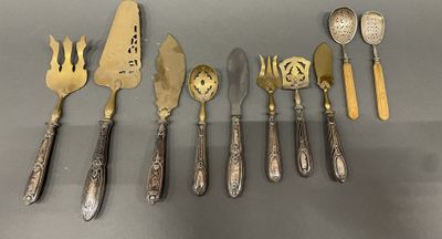 several different types of silverware including spoons, forks and spoons