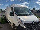 a white van that is parked in a parking lot