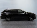 a picture of a black car parked in a room