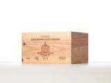 a wooden box with a wine label on it