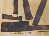 une photo d'un morceau de bois sur lequel figurent des inscriptions