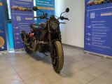 a motorcycle that is parked in a showroom