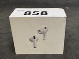 a box with a pair of airpods in it
