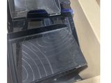 two trays that are sitting in a box