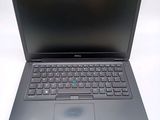 a laptop computer with a keyboard on the top of it
