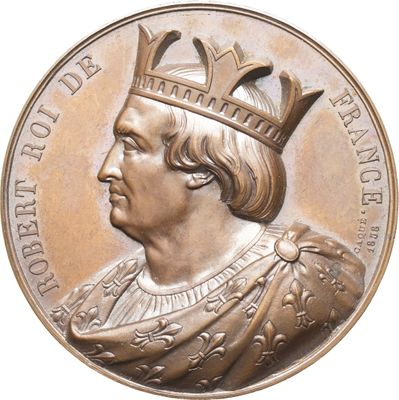 une image montrant un gros plan d'une médaille sur laquelle figure une couronne
