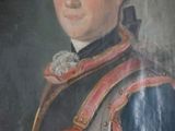 portrait of a man in a military uniform in a gold frame