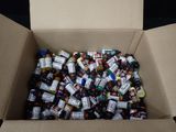 a cardboard box filled with bottles of beer