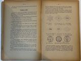 a book open to a page with a picture of a clock on it