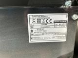 a label on the back of a machine that is not working