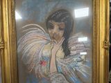a painting of a woman in a gold frame on a table