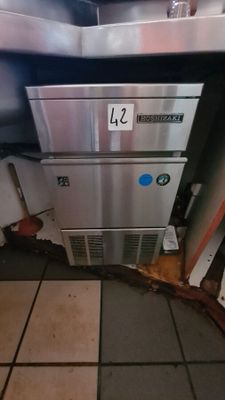 an image of a kitchen with a stove and a sink