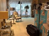 a room that has a lot of boxes on the floor
