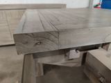 a close up of a piece of wood on a table