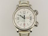 a close up of a watch on a white surface