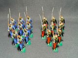 many figurines of men dressed in blue and orange uniforms