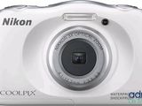 a close up of a white camera on a white background