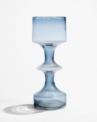an image of a blue glass vase on a white background