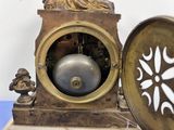 a clock that is sitting on top of a table