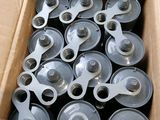 a cardboard box filled with lots of different types of wheels