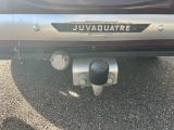 a close up of a car ' s license plate on the back of it